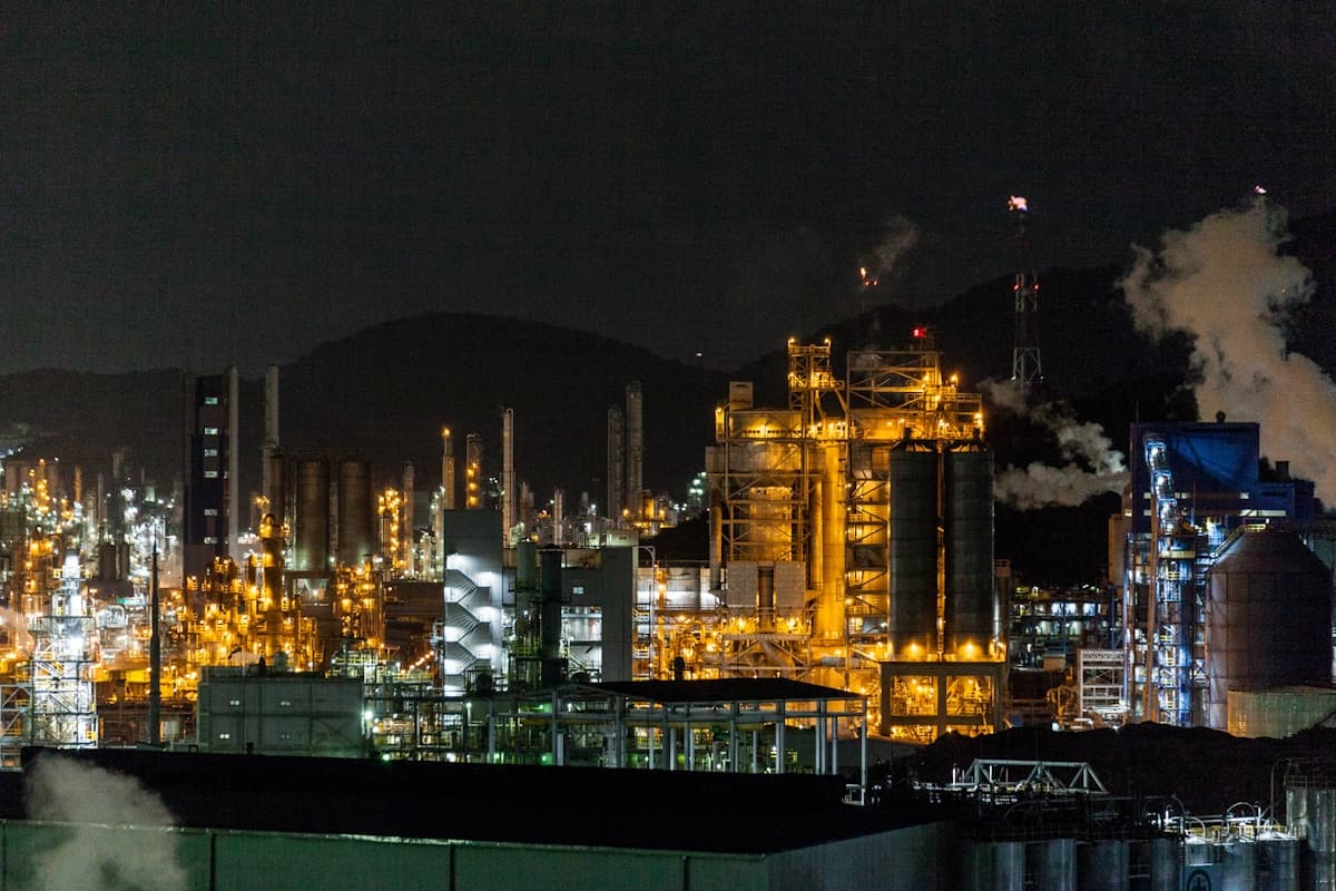 Chemical refinery and processing plant illuminated at night